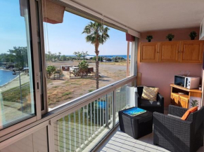 Amoureva B35, T2 vue mer, parking, piscine, clim